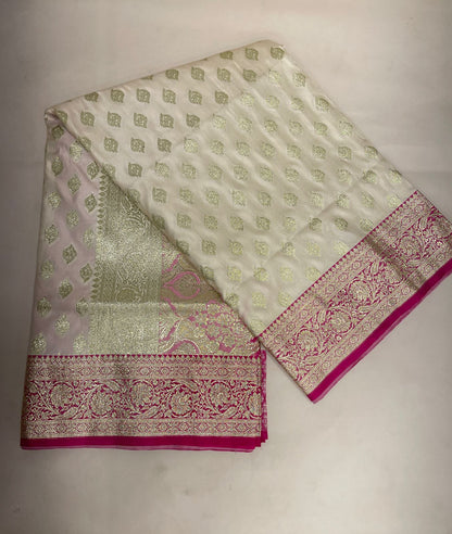 Faishana Presents Off-White Katan Silk Floral Light Gold Zari Booti with Contrast Magenta Floral Pallu Banarasi saree and Magenta Blouse