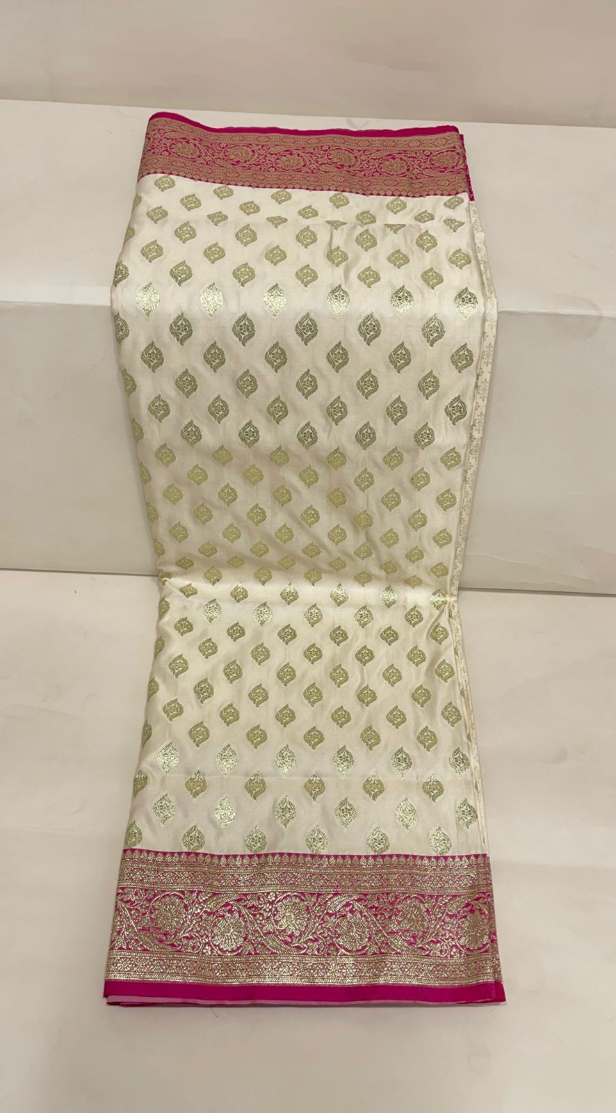 Faishana Presents Off-White Katan Silk Floral Light Gold Zari Booti with Contrast Magenta Floral Pallu Banarasi saree and Magenta Blouse