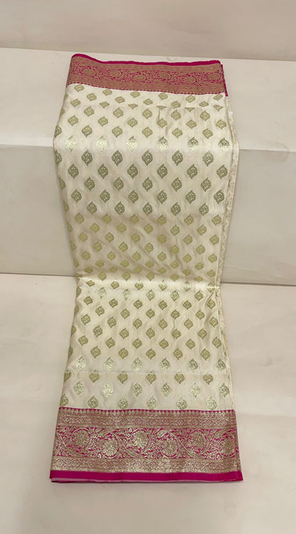 Faishana Presents Off-White Katan Silk Floral Light Gold Zari Booti with Contrast Magenta Floral Pallu Banarasi saree and Magenta Blouse