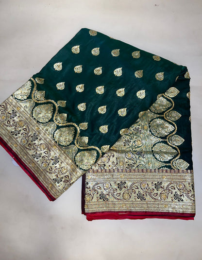 Faishana Presents Dark Green Stone Work Golden Zari Booti with Contrast Red Paisley Lehariya Pallu Zari Border with Red Blouse Banarasi Saree
