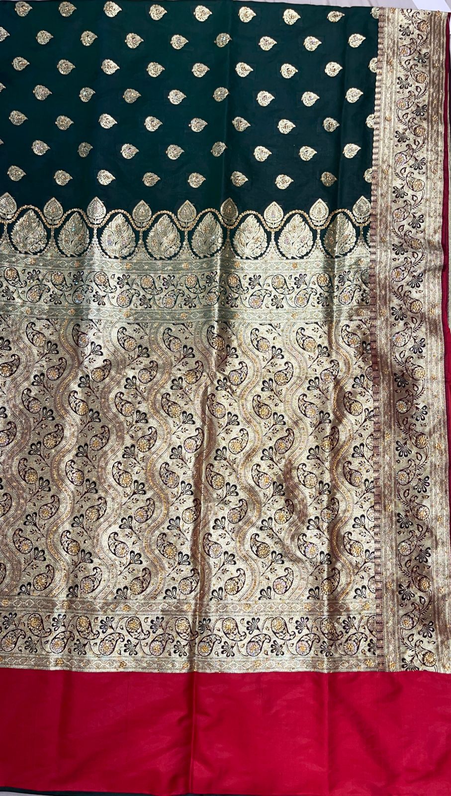 Faishana Presents Dark Green Stone Work Golden Zari Booti with Contrast Red Paisley Lehariya Pallu Zari Border with Red Blouse Banarasi Saree