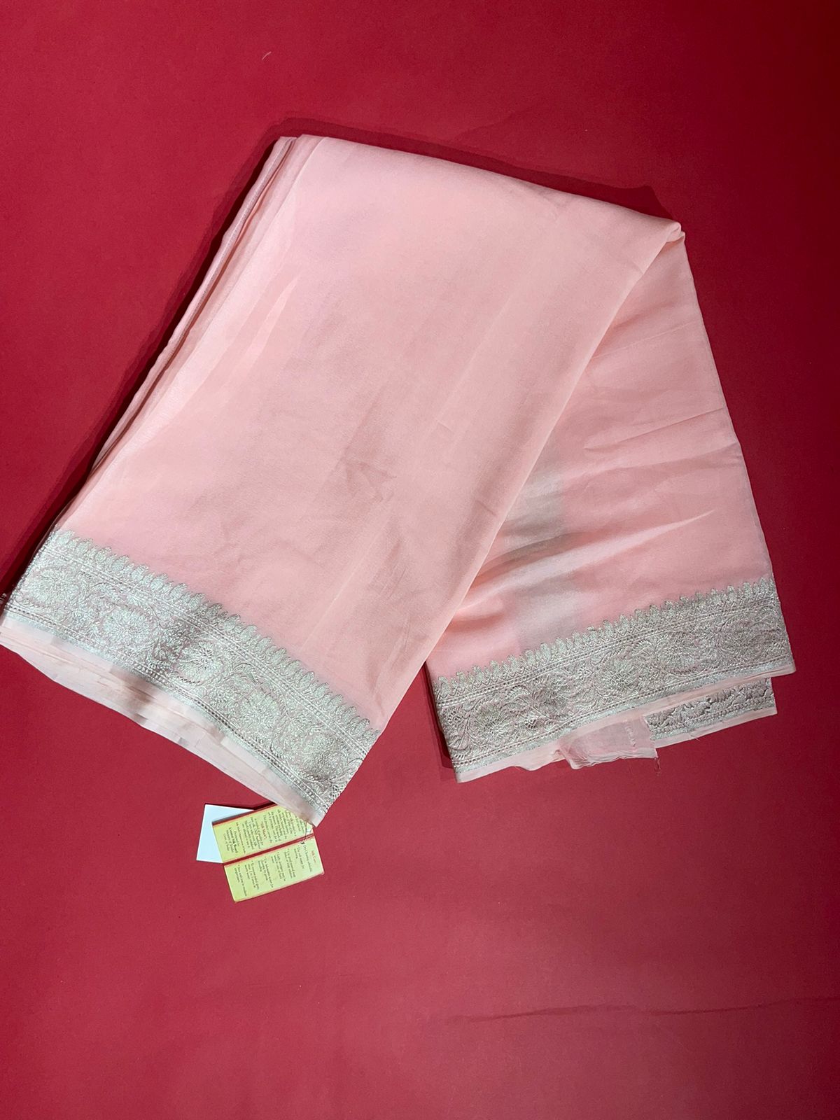 Faishana Presents Puresilk Peach Plain Khaddi Georgette Silver Zari Kadhwa Border Saree with Peach Blouse