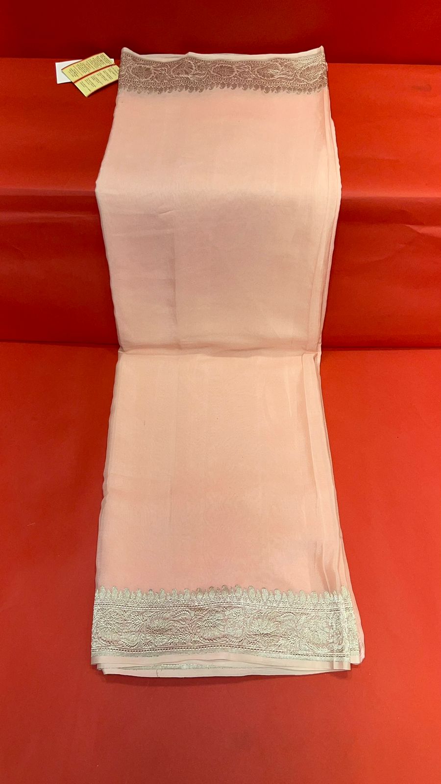 Faishana Presents Puresilk Peach Plain Khaddi Georgette Silver Zari Kadhwa Border Saree with Peach Blouse