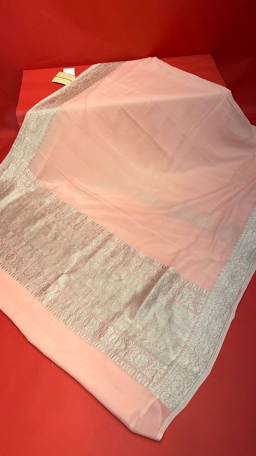 Faishana Presents Puresilk Peach Plain Khaddi Georgette Silver Zari Kadhwa Border Saree with Peach Blouse