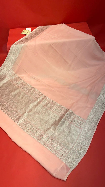 Faishana Presents Puresilk Peach Plain Khaddi Georgette Silver Zari Kadhwa Border Saree with Peach Blouse