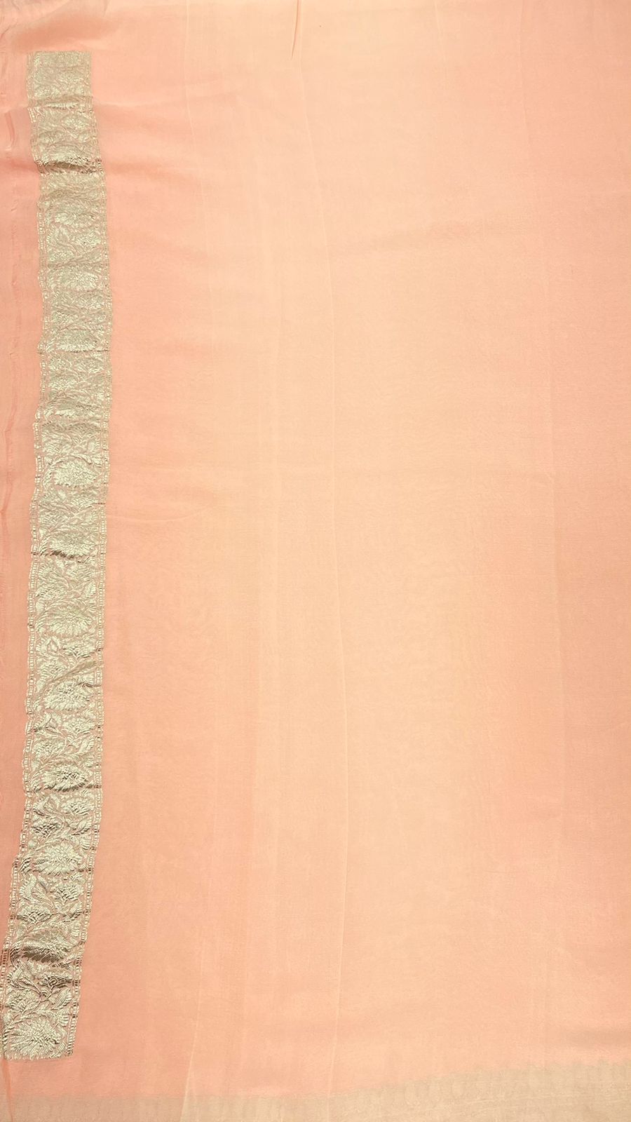 Faishana Presents Puresilk Peach Plain Khaddi Georgette Silver Zari Kadhwa Border Saree with Peach Blouse