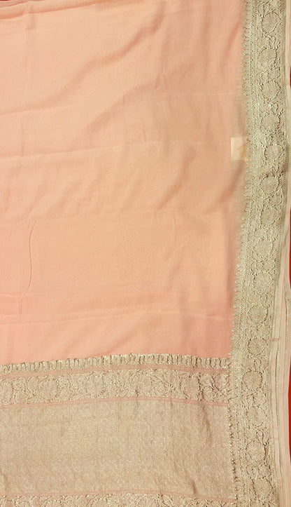 Faishana Presents Puresilk Peach Plain Khaddi Georgette Silver Zari Kadhwa Border Saree with Peach Blouse
