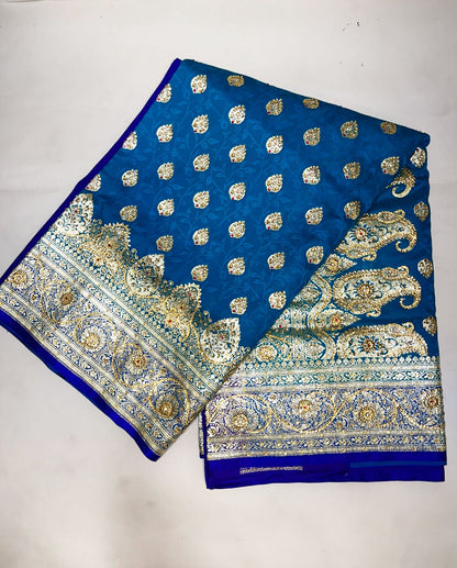 Faishana Presents Turquoise Blue Stone Work Golden Zari Booti Afli Mina Jaal with Alfi Boota Pallu Zari Border and Blue Blouse Banarasi Saree