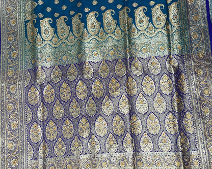 Faishana Presents Turquoise Blue Stone Work Golden Zari Booti Afli Mina Jaal with Alfi Boota Pallu Zari Border and Blue Blouse Banarasi Saree