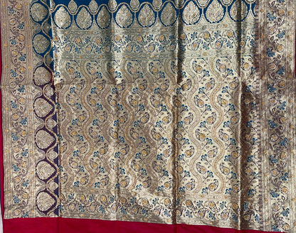 Faishana Presents Indigo Blue Stone Work Golden Zari Booti with Contrast Maroon Paisley Lehariya Pallu Zari Border with Maroon Blouse Banarasi Saree