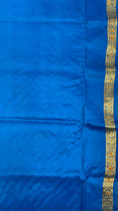 Faishana Presents Turqouise Blue Stone Work Golden Zari Booti Jaal with Paisely Boota Pallu Zari Border Banarasi Saree