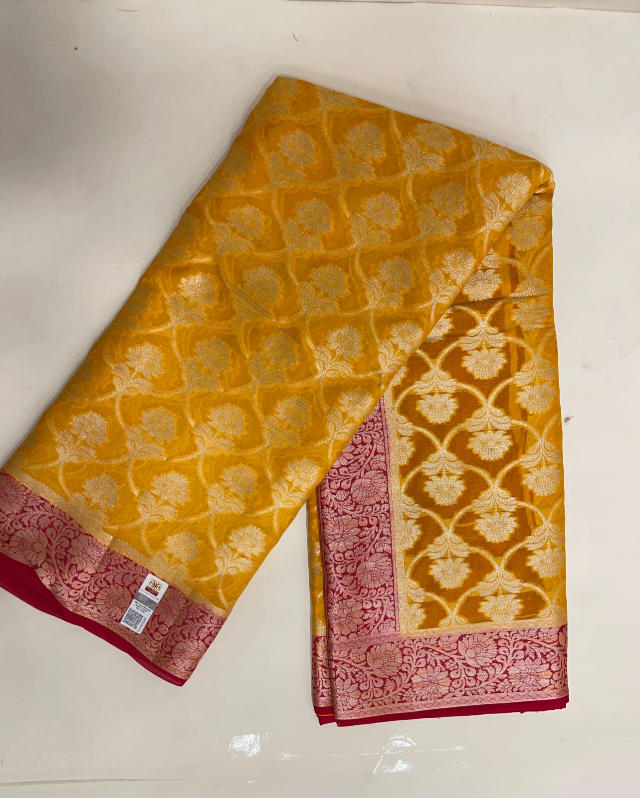 Faishana Pure Handloom Yellow Chiffon Golden Zari Floral Booti Jaal with Contrast Red Zari Booti Anchal and Zari Border with Red Blouse