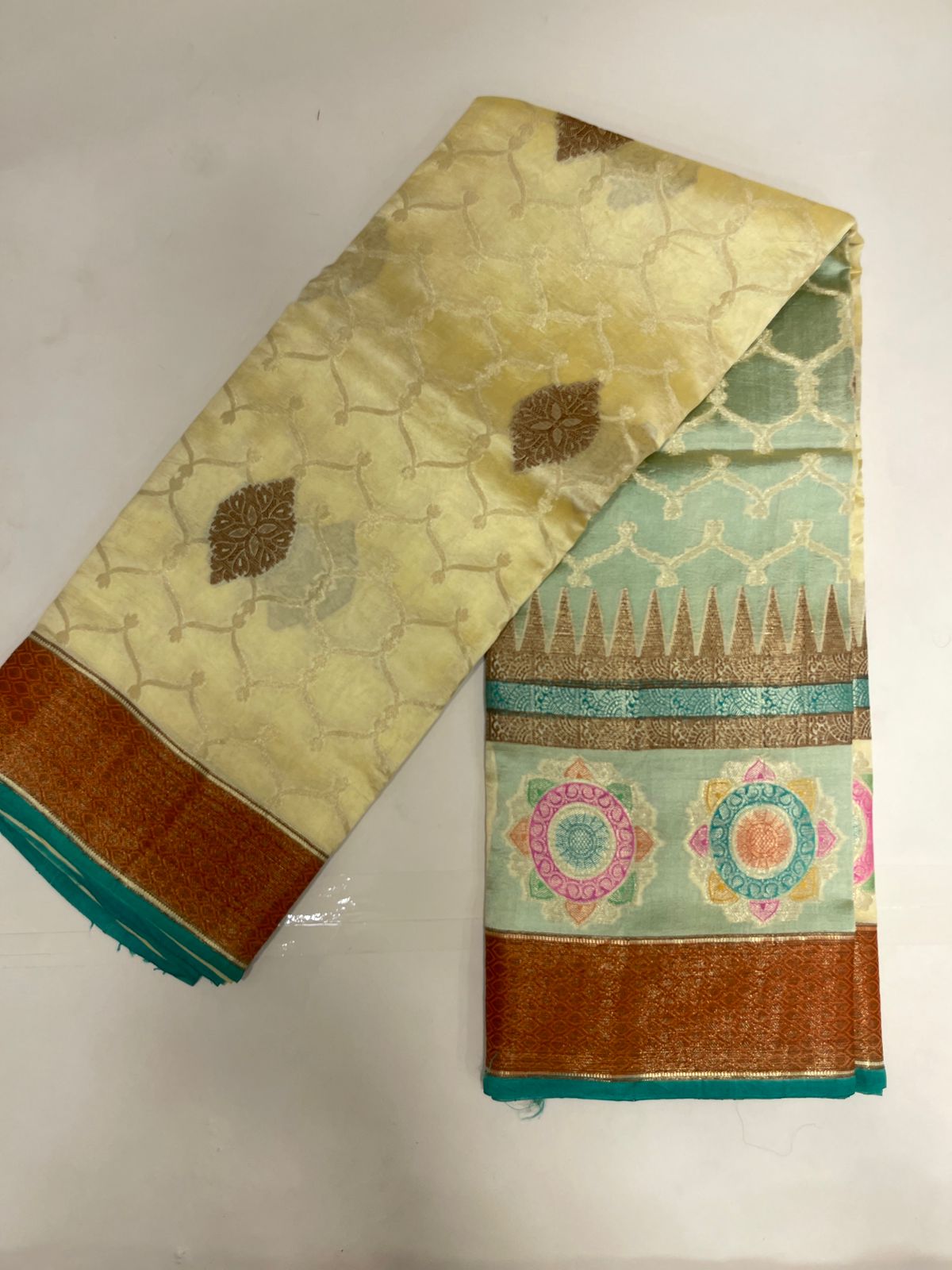 Faishana Pure Handloom Lemon Yellow Dupion Silk Copper Zari Boota Alfi Zari Jaal with Contrast Orange Pallu and Skirt Rangkaat Boota Border with Sea Green Blouse
