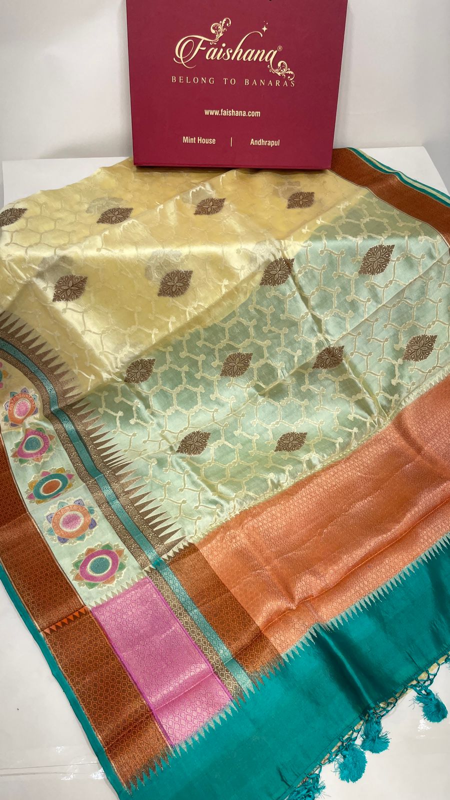 Faishana Pure Handloom Lemon Yellow Dupion Silk Copper Zari Boota Alfi Zari Jaal with Contrast Orange Pallu and Skirt Rangkaat Boota Border with Sea Green Blouse