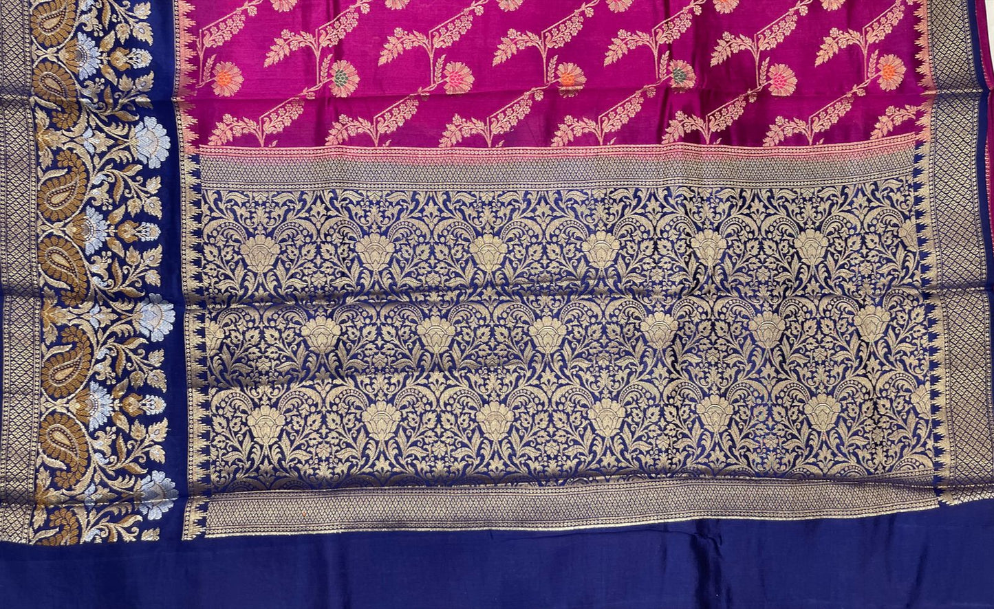 Faishana Pure Handloom Magenta Dupion Silk Floral Mina Jaal with Contrast Indigo Blue Silver Mina Golden Skirt Border and Indigo Blue Blouse