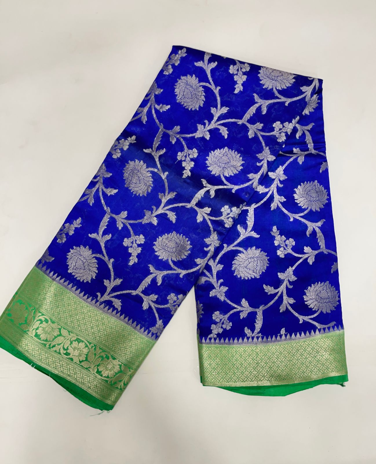Faishana Pure Handloom Royal Blue Chiniya Silk Floral Silver Zari Tilfi Jaal with Contrast Green Zari Border and Green Blouse