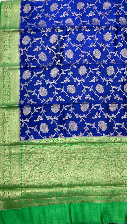 Faishana Pure Handloom Royal Blue Chiniya Silk Floral Silver Zari Tilfi Jaal with Contrast Green Zari Border and Green Blouse