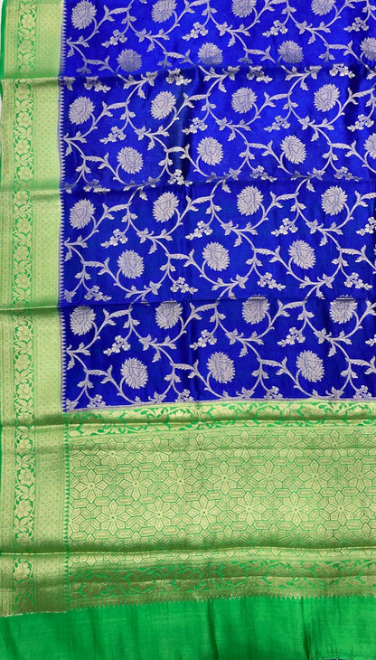 Faishana Pure Handloom Royal Blue Chiniya Silk Floral Silver Zari Tilfi Jaal with Contrast Green Zari Border and Green Blouse