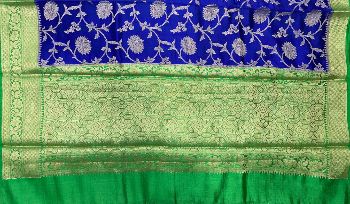 Faishana Pure Handloom Royal Blue Chiniya Silk Floral Silver Zari Tilfi Jaal with Contrast Green Zari Border and Green Blouse