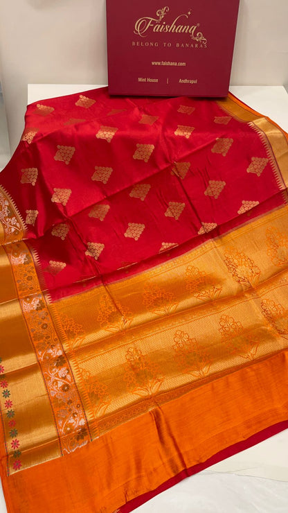 Faishana Pure Handloom Red Chiniya Silk Golden Floral Zari Booti Contrast Orange Skirt Silver Mina Zari Dual Border and Orange Floral Boota Pallu with Orange Blouse