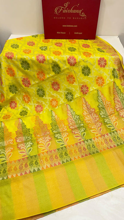 Faishana Presents Yellow Semi Georgette Alfi Mina Floral Zari Jaal Minakari Zari Border with Banarasi Floral Boota Pallu and Yellow Multi Stripe Blouse