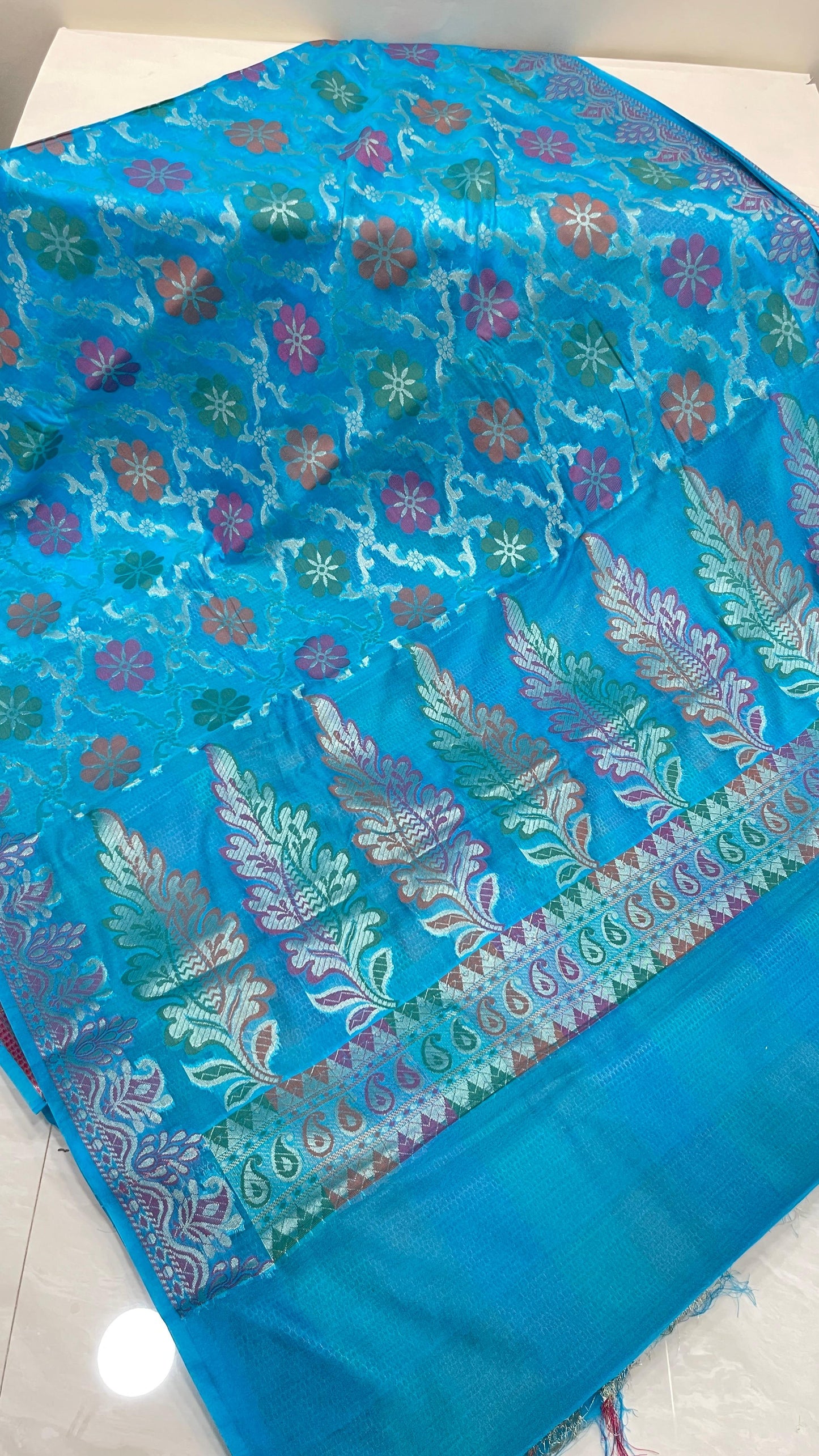 Faishana Presents Sky Blue Semi Georgette Alfi Mina Floral Zari Jaal Minakari Zari Border with Banarasi Floral Boota Pallu and Blue Multi Stripe Blouse