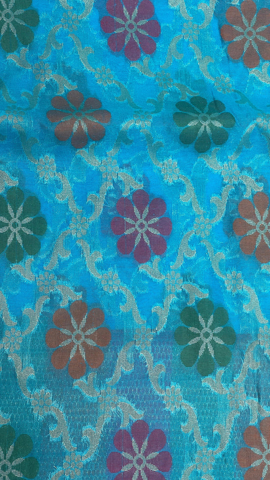Faishana Presents Sky Blue Semi Georgette Alfi Mina Floral Zari Jaal Minakari Zari Border with Banarasi Floral Boota Pallu and Blue Multi Stripe Blouse