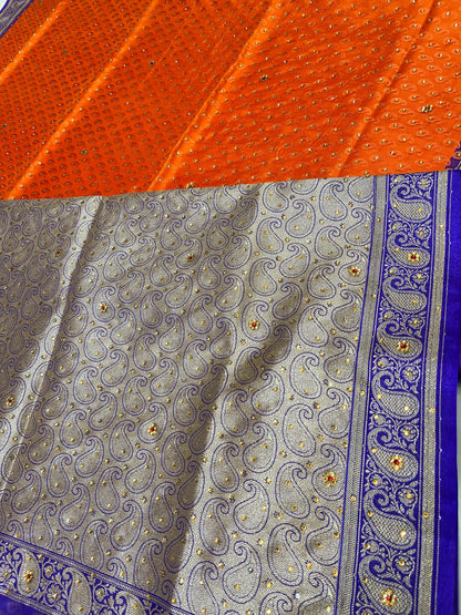 Faishana Presents Orange Tanchoi Silk Low Stone Work with Contrast Blue Pallu Zari Border and Purple Blouse