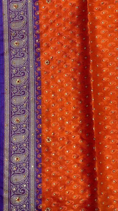 Faishana Presents Orange Tanchoi Silk Low Stone Work with Contrast Blue Pallu Zari Border and Purple Blouse