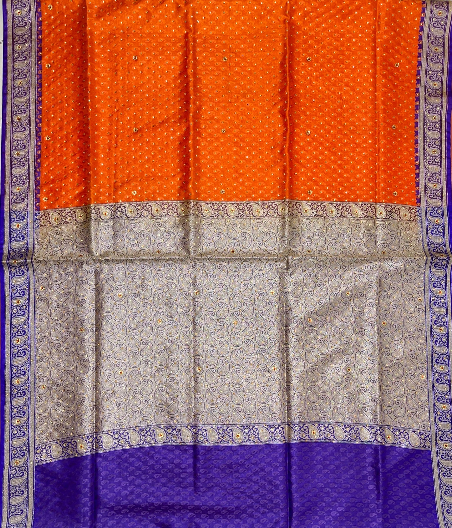 Faishana Presents Orange Tanchoi Silk Low Stone Work with Contrast Blue Pallu Zari Border and Purple Blouse