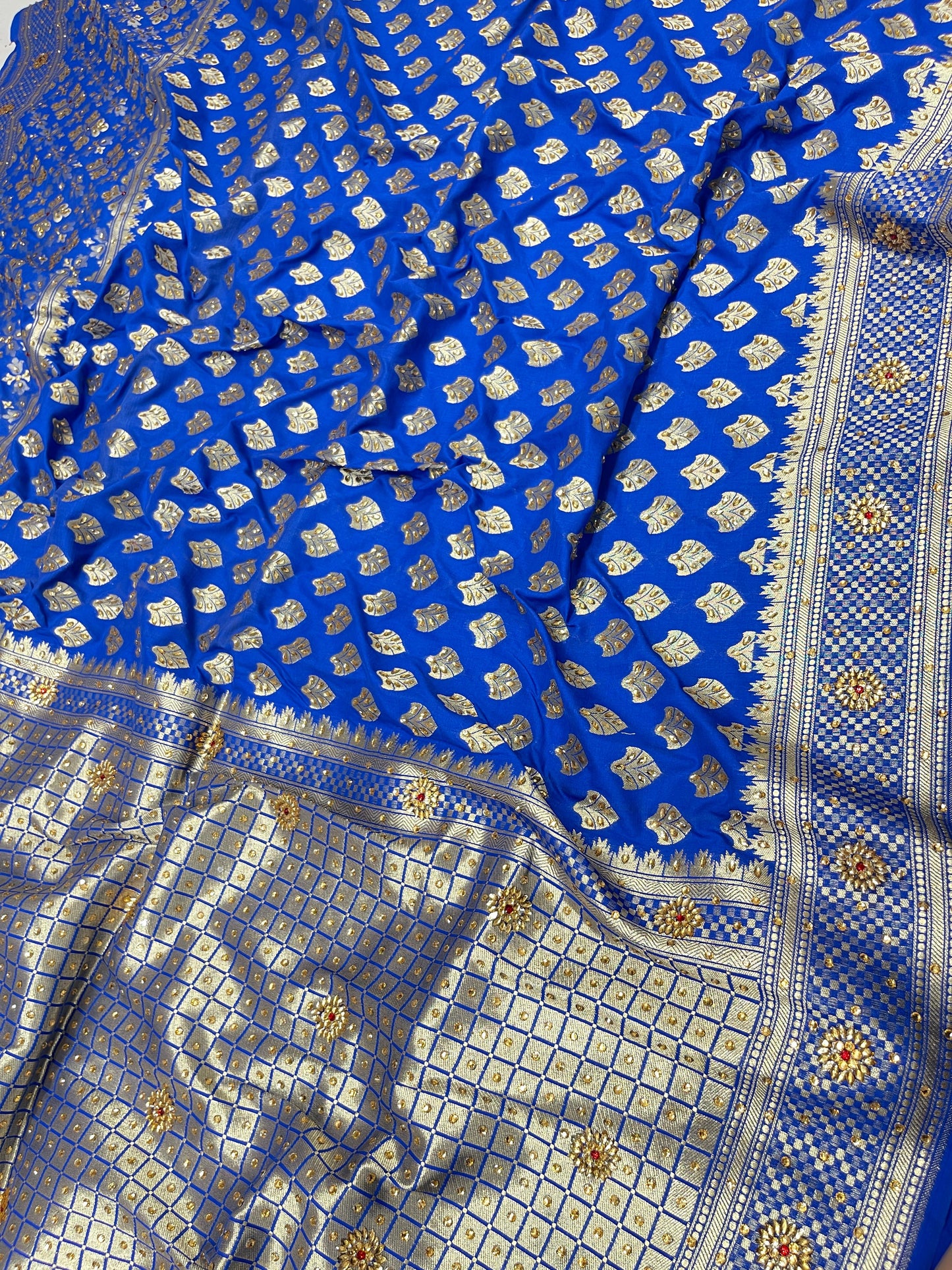 Faishana Presents Blue Satin Silk Floral Zari Booti Low Stone Work Banarasi Saree with Checkered Pallu Skirt Zari Border and Blue Blouse