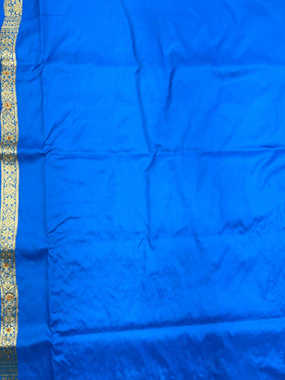 Faishana Presents Turqouise Blue Satin Silk Floral Paisley Zari Jaal Low Stone Work Banarasi Saree with Paisley Boota Pallu and Blue Blouse
