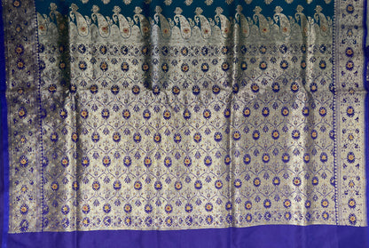 Faishana Presents Seagreen Satin Silk Floral Zari Booti Low Stone Work Banarasi Saree with Contrast Purple Pallu and Purple Blouse