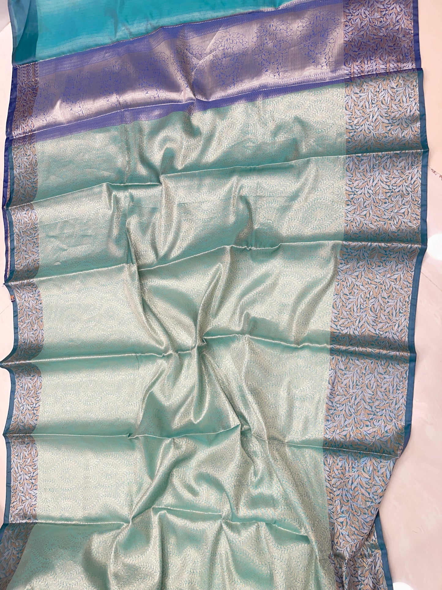 Faishana Presents Sea Green Art Silk Floral Lehariya Sliver Jaal with Contrast Blue Pallu and Blue Copper Silver Jaal Zari Border with Blue Blouse