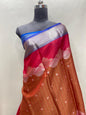 Faishana Presents Orange Floral Mina Zari Stripe and Dual Skirt Copper and Silver Boota with Contrast Beige Pallu Blue Zari Border and Blue Blouse