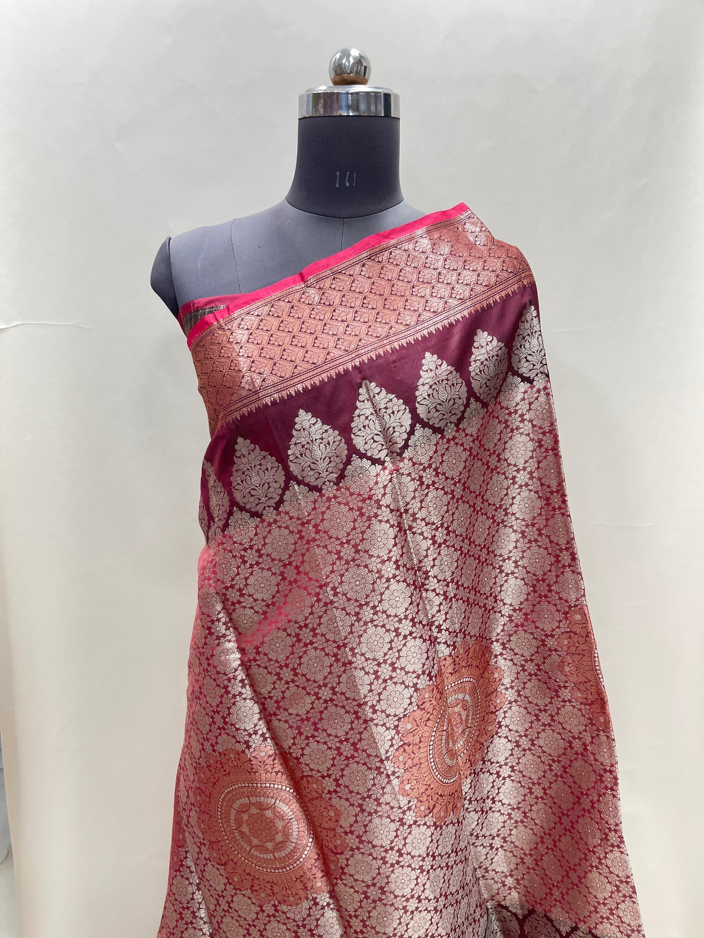 Faishana Presents Burgundy Art Silk Floral Zari Boota Sliver Jaal and Dual Skirt Silver Zari Boota Copper Zari Border with Contrast Black Pallu and Black Blouse