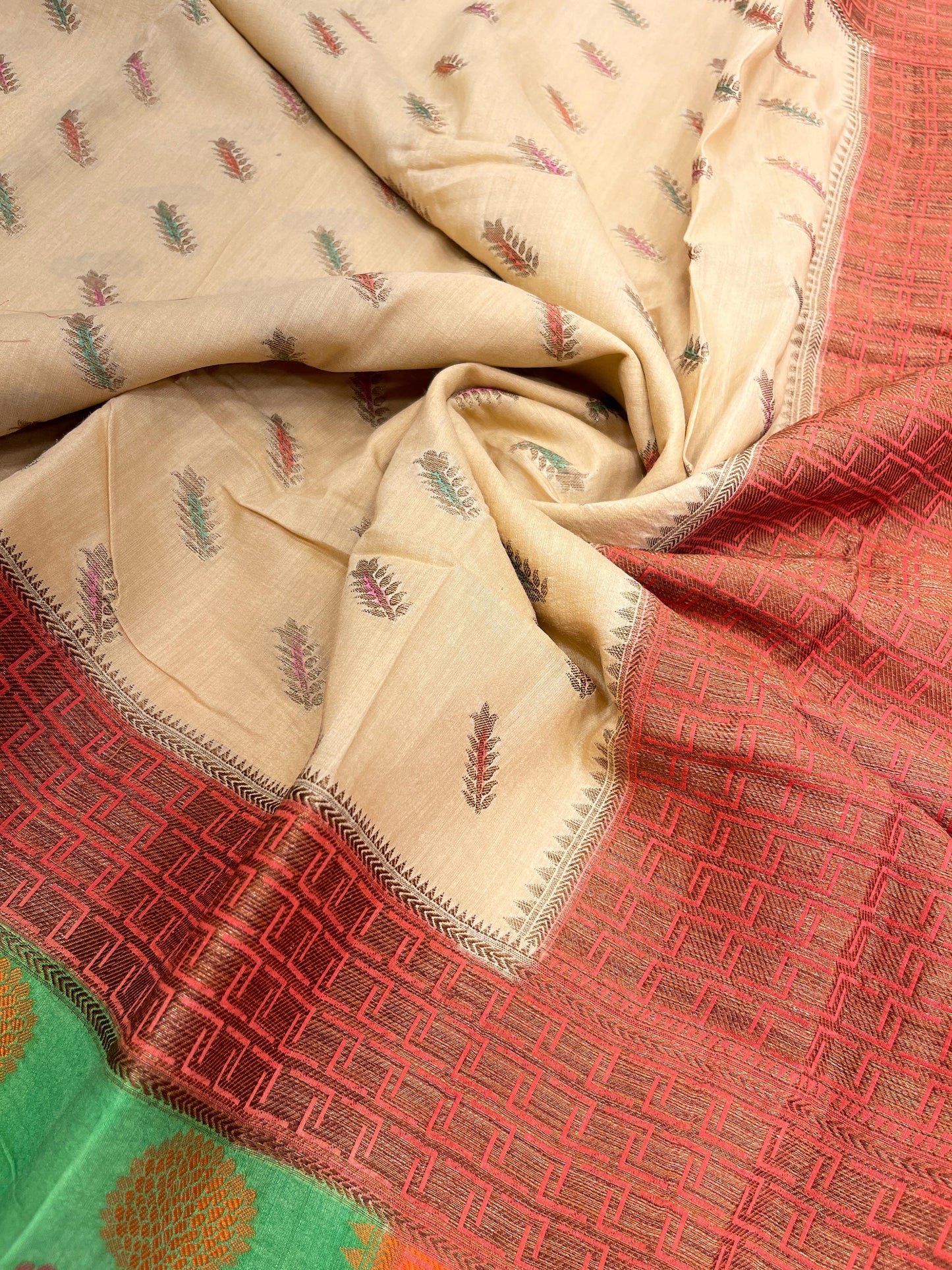 Faishana Pure Handloom Cream Munga Silk Floral Mina Booti with Contrast Orange Floral Minakari Green Pallu Zari Border and Cream Blouse