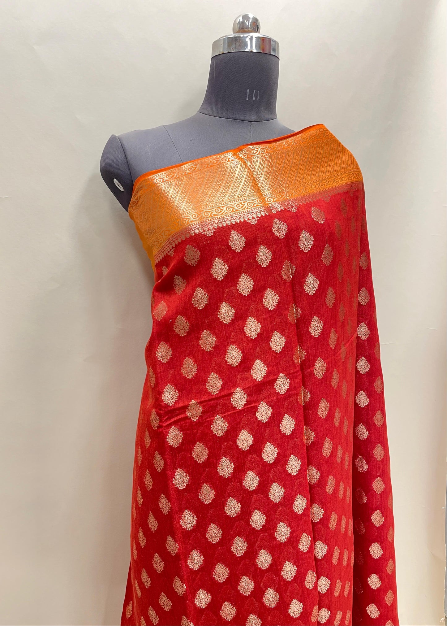 Faishana Pure Handloom Red Munga Silk Floral Gold Zari Booti with Contrast Orange Floral Jaal Pallu Skirt Dual Shade Zari Border with Orange Blouse