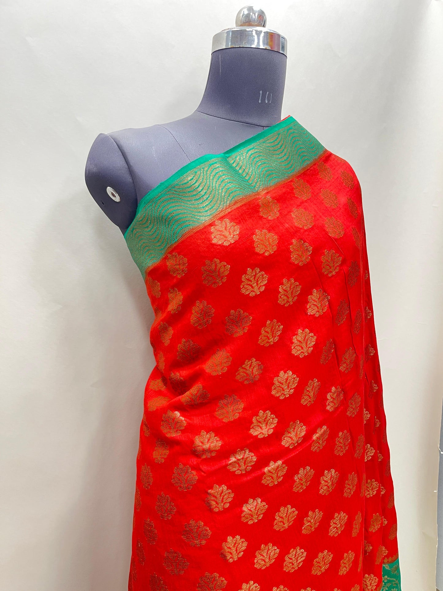 Faishana Pure Handloom Red Munga Silk Floral Copper Zari Booti with Contrast Blue Jaal Skirt Dual Shade Green Floral Zari Border and Blue Blouse