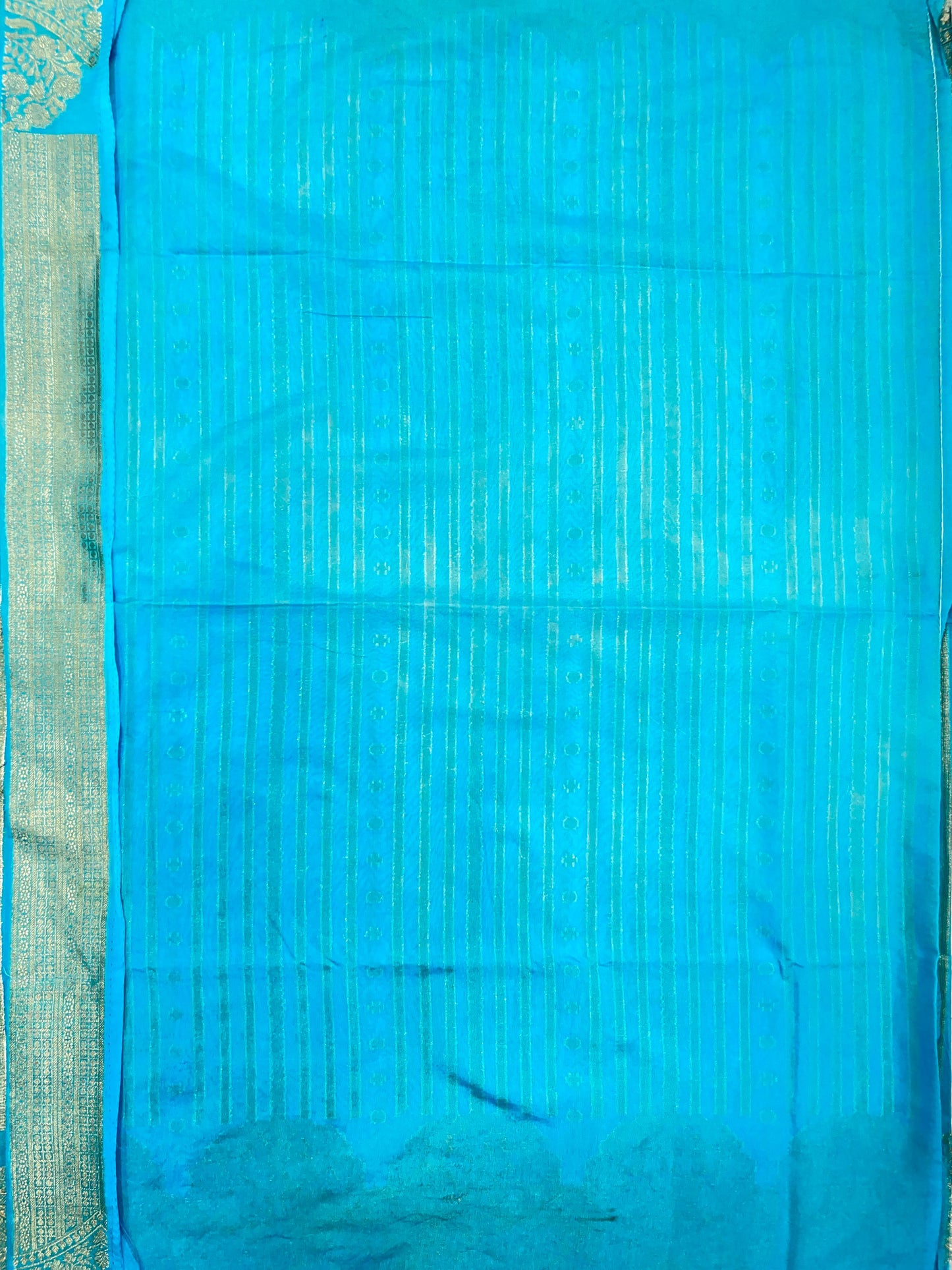 Faishana Presents Sky Blue Semi Georgette Golden Zari Stripe Banarasi Saree with Blouse.