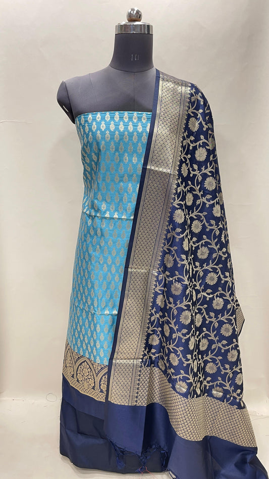 Faishana Presents Blue Semi Katan Silk 3 pcs Suit Set with Contrast Navy Blue Plain Bottom and Top Floral Zari Booti with Alfi Jaal Navy Blue Dupatta ASD_115