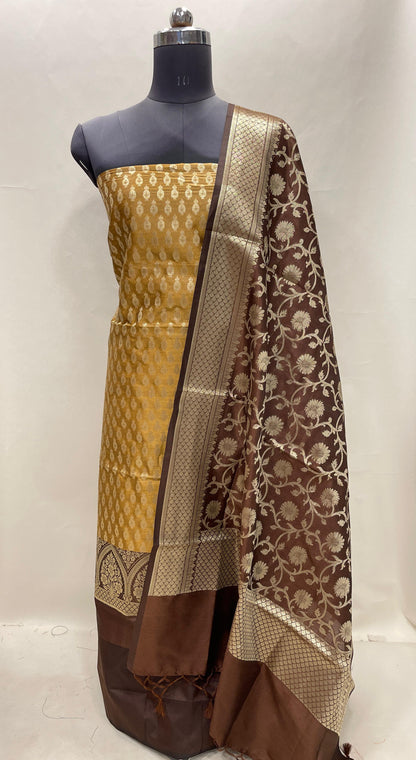 Faishana Presents Mustard Gold Semi Katan Silk 3 pcs Suit Set with Contrast Brown Plain Bottom and Top Floral Zari Booti with Alfi Jaal Brown Dupatta ASD_116