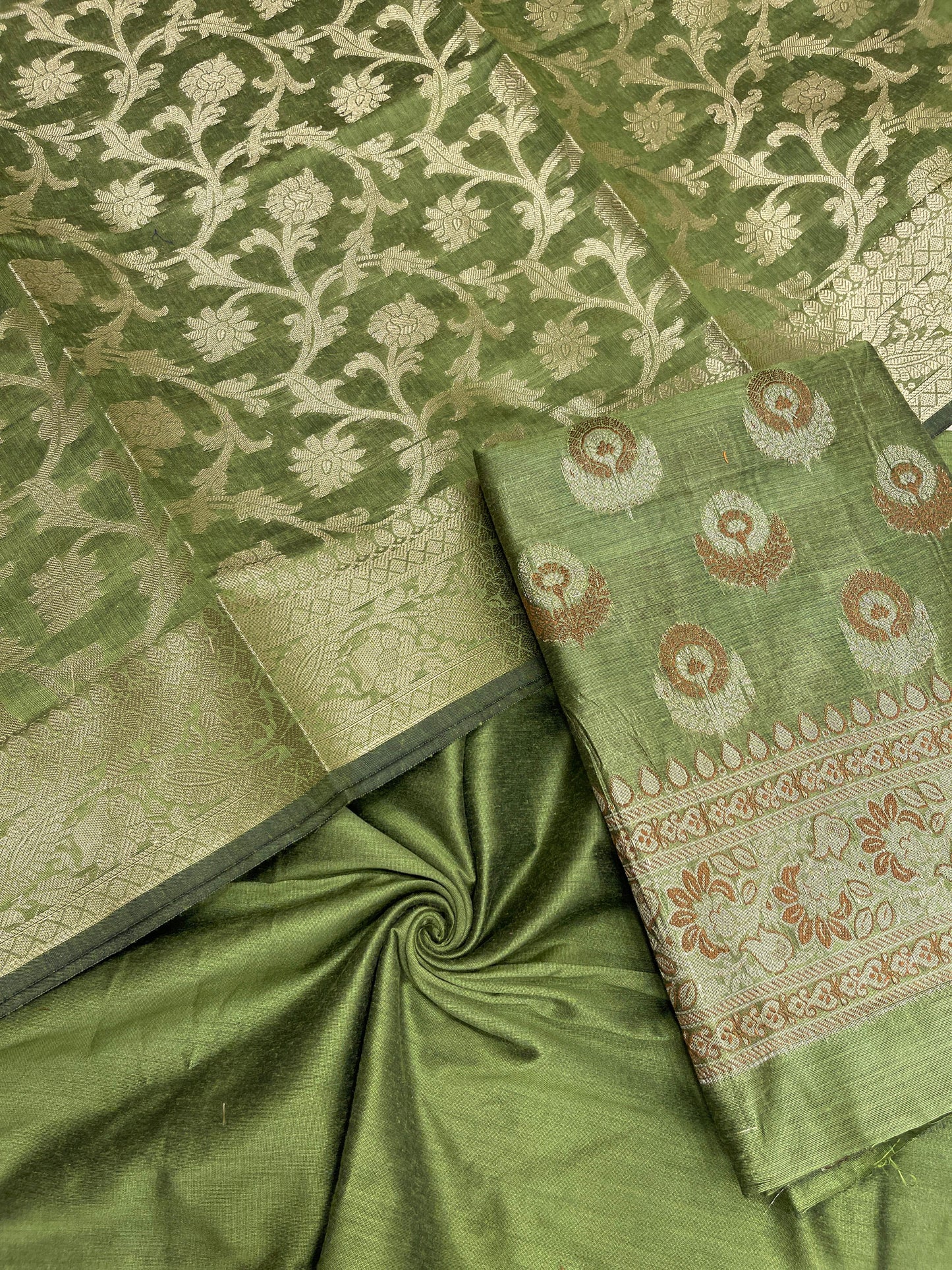 Green cotton suit featuring floral zari resham mina bootis and jaal dupatta. SHL_13