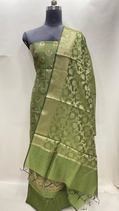 Green cotton suit featuring floral zari resham mina bootis and jaal dupatta. SHL_13