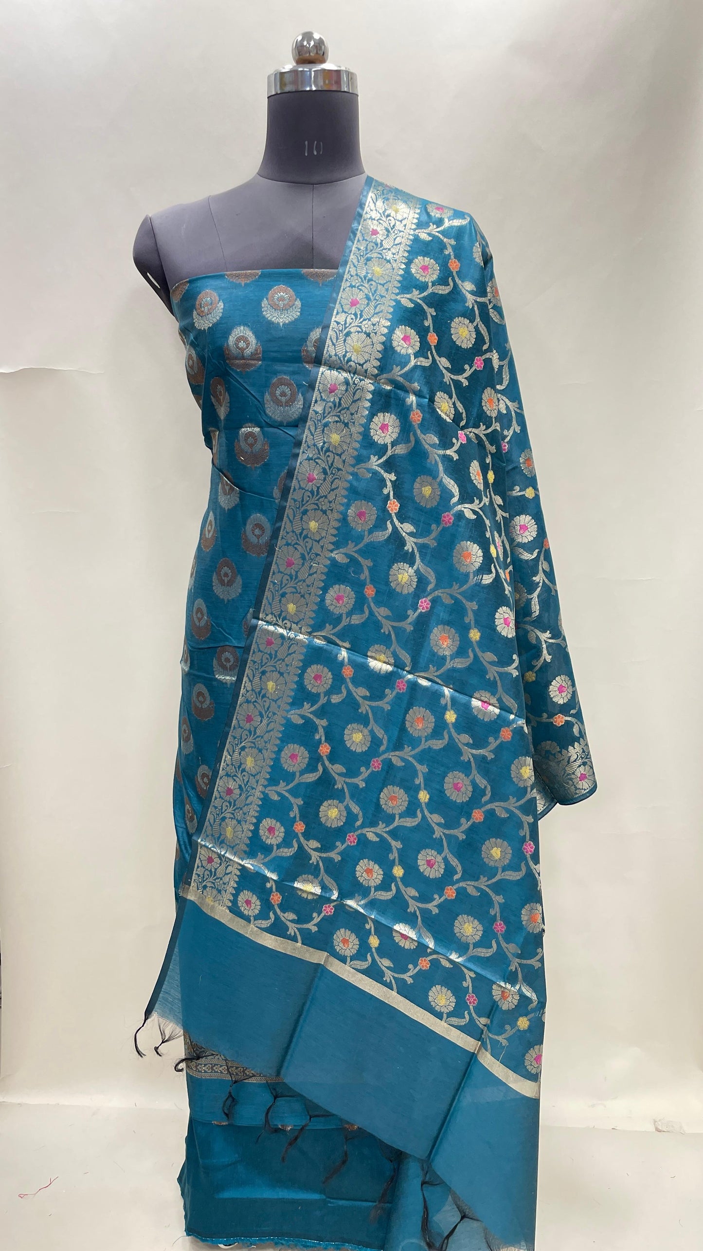 Dark seagreen cotton suit with floral zari resham mina bootis and jaal dupatta. SHL_12