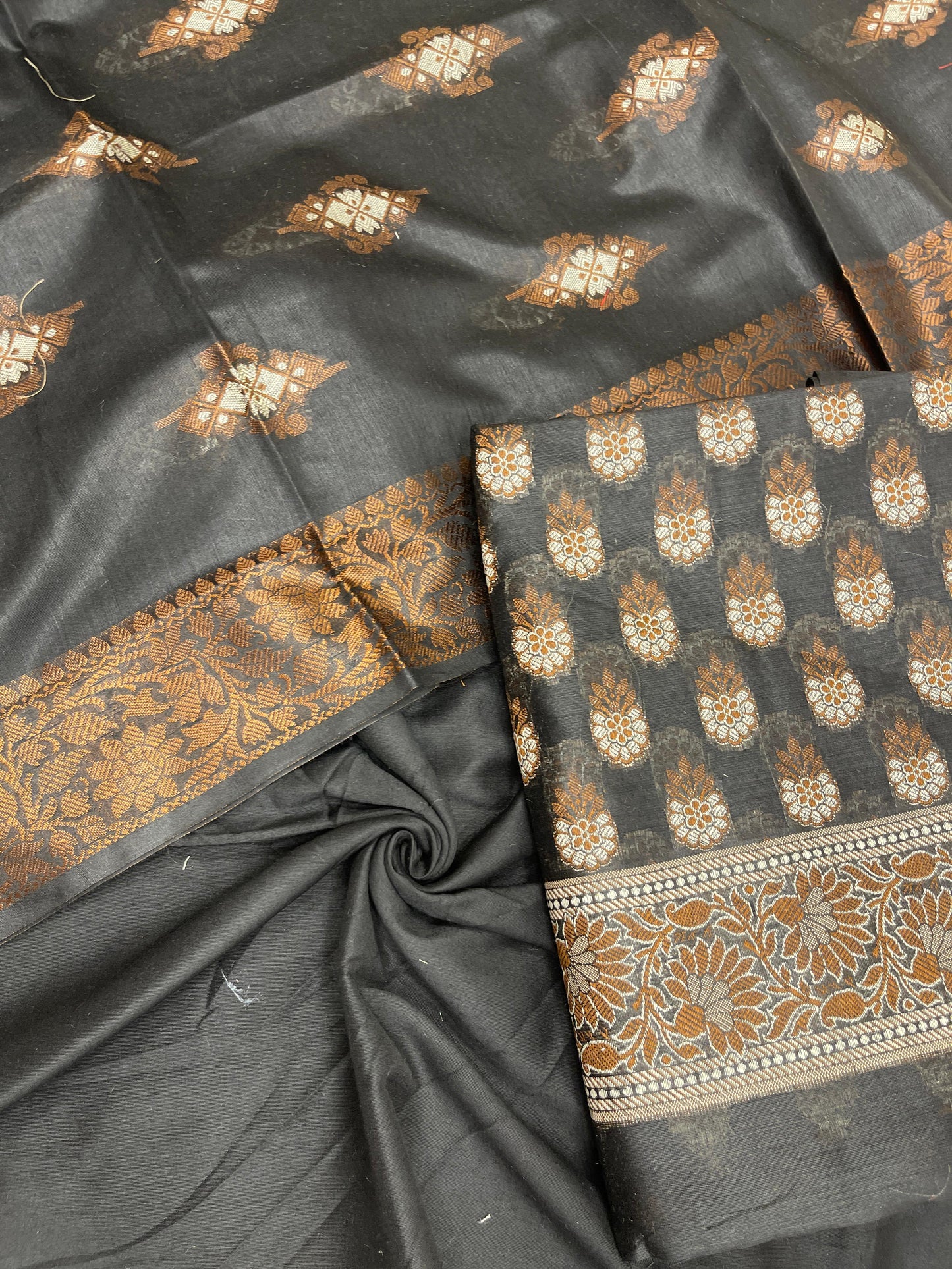 Black cotton suit set featuring floral resham mina bootis and matching dupatta. SHL_25