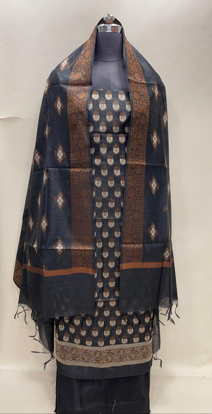 Black cotton suit set featuring floral resham mina bootis and matching dupatta. SHL_25