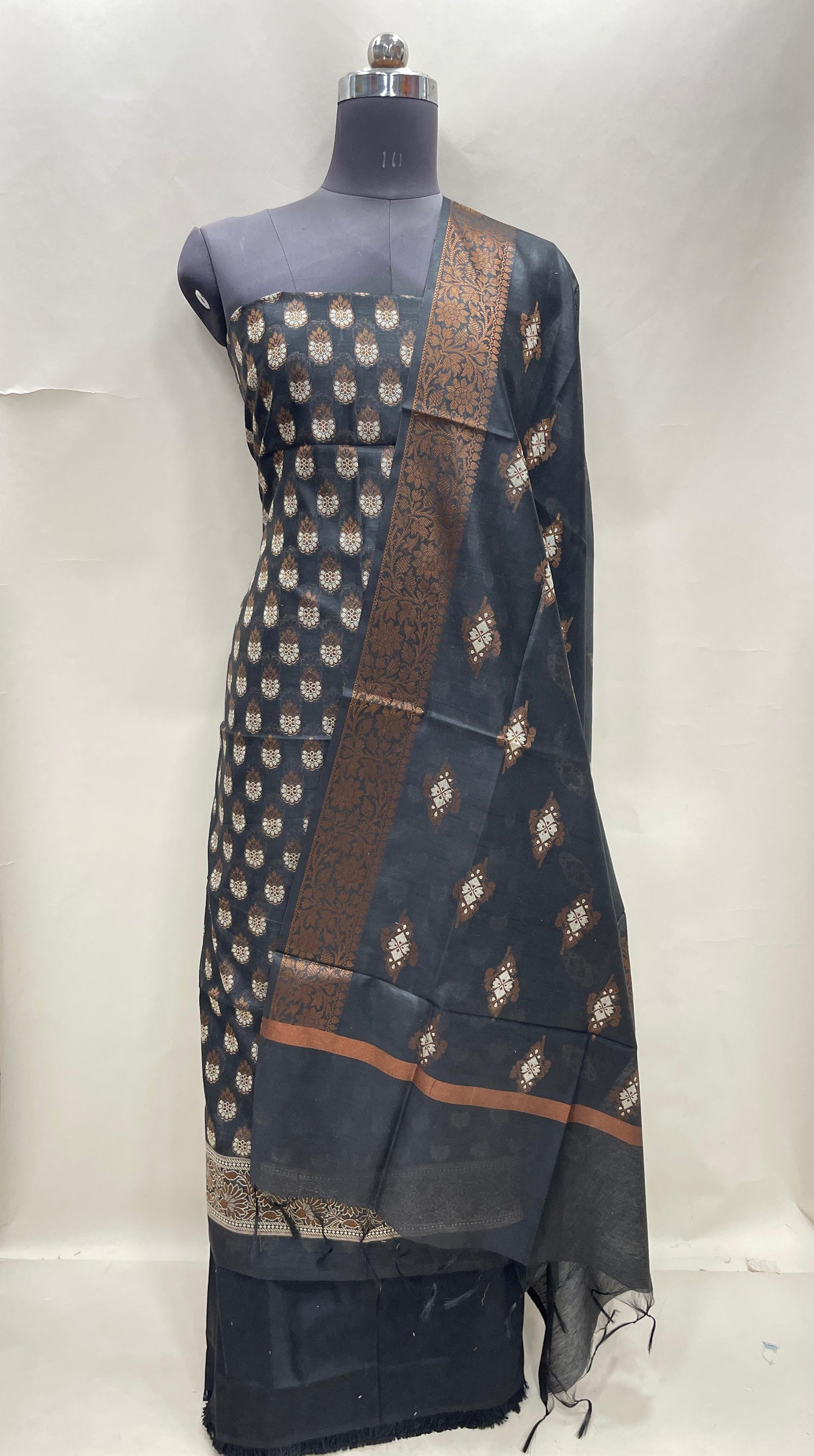 Black cotton suit set featuring floral resham mina bootis and matching dupatta. SHL_25