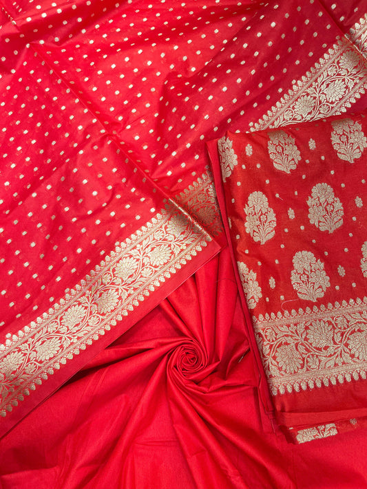 Red semi-georgette suit set featuring floral silver zari bootis and matching dupatta. SHL_43