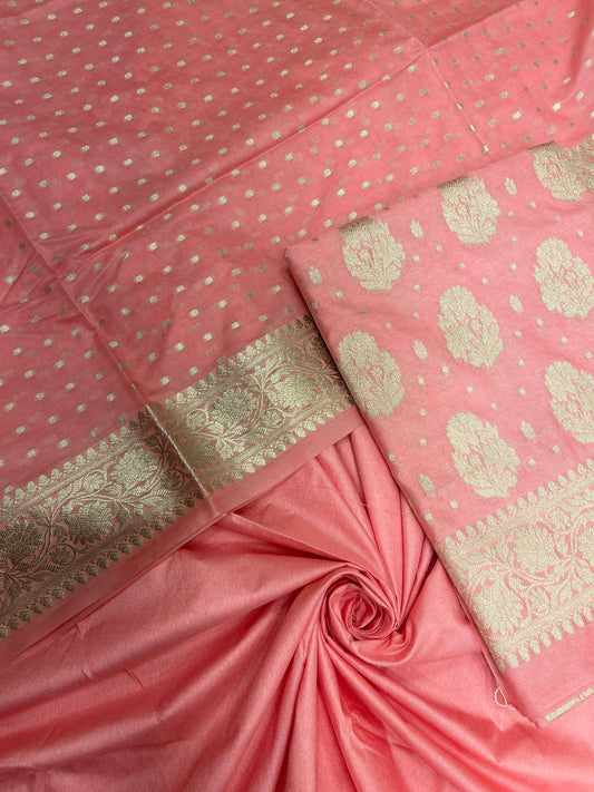 Peach semi-georgette suit set featuring floral silver zari bootis and matching dupatta. SHL_39